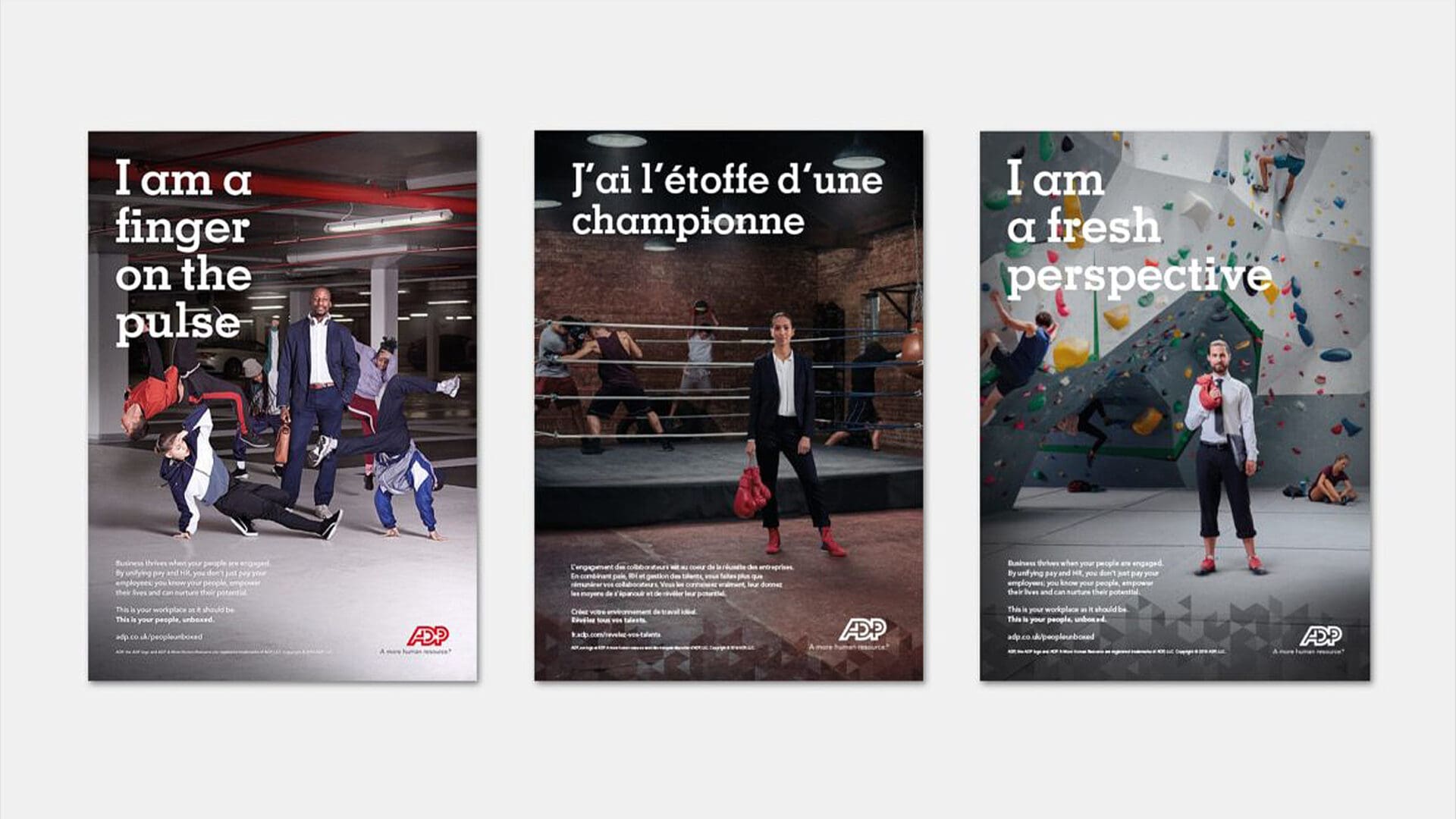 Three posters feature phrases: "I am a finger on the pulse," "J'ai l'étoffe d'une championne," and "I am a fresh perspective."