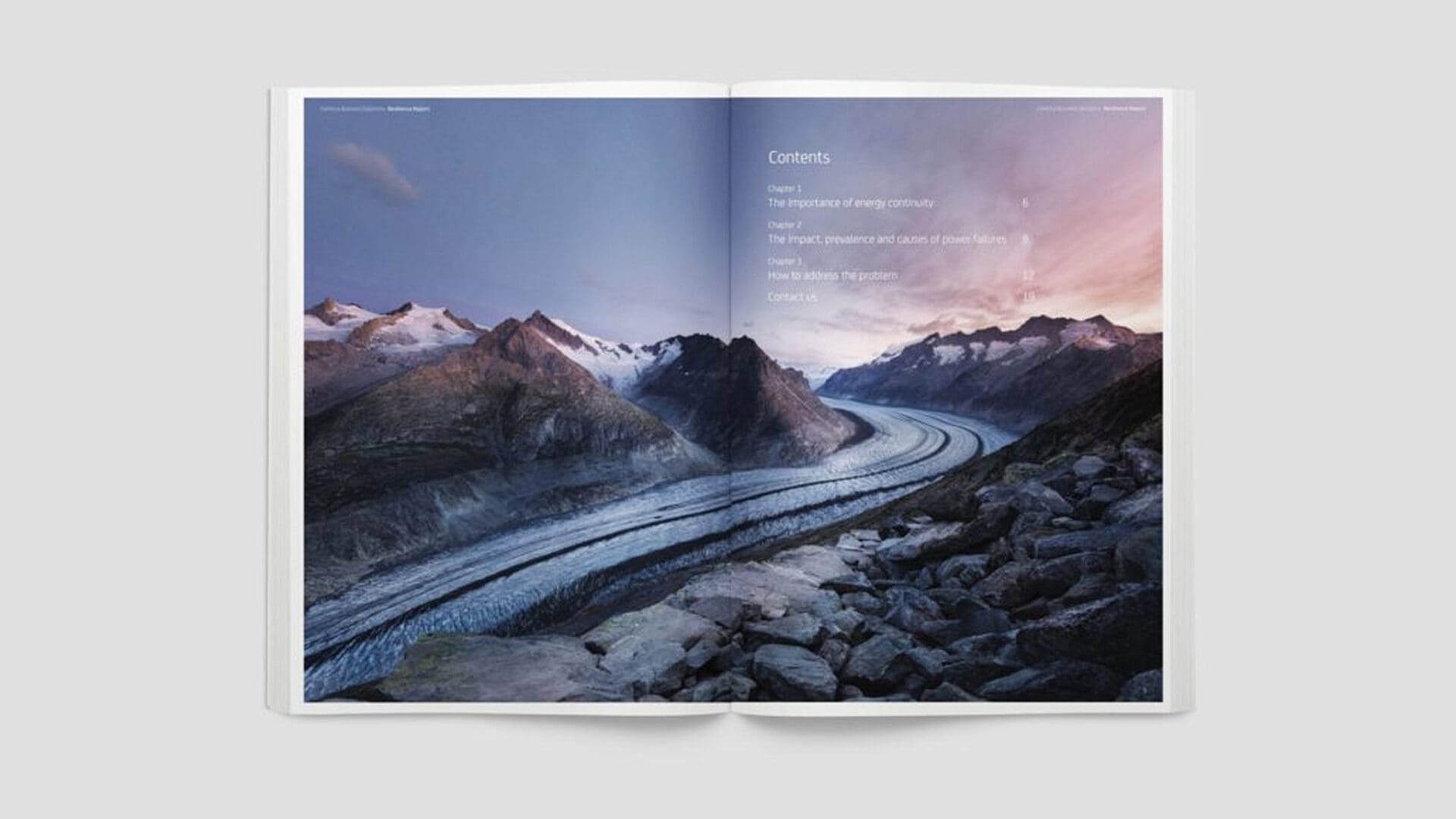 Open book displaying mountain landscape, with "Contents" and chapter titles listed.